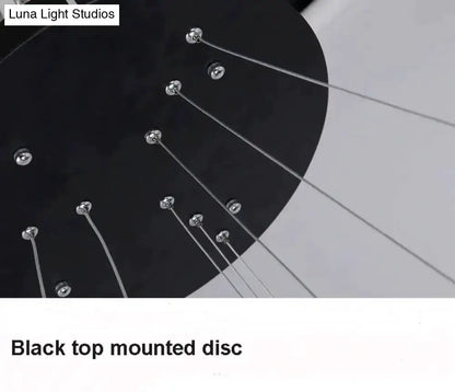 Modern interlocking ring LED pendant light with black disc canopy and slim cables Decorbites on Tampa Home & Garden Store