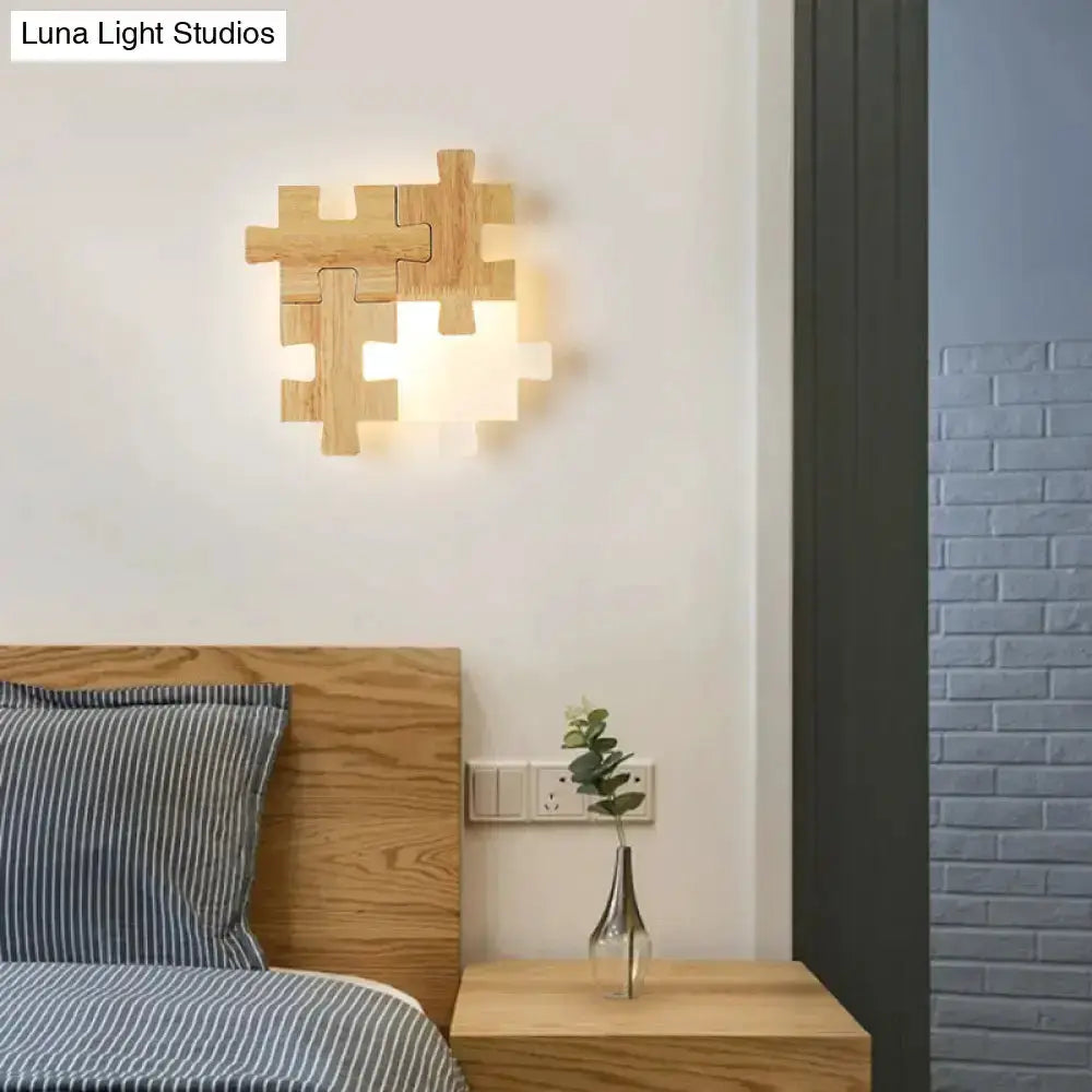 Modern jigsaw wood wall lamp sconce with wood puzzle pieces and warm LED light Decorbites on Tampa Home & Garden Store