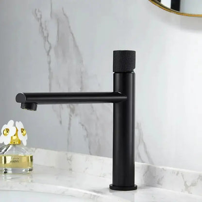 Modern knurled matte black basin faucet with tall cylindrical body and horizontal spout on Tampa Home & Garden Store