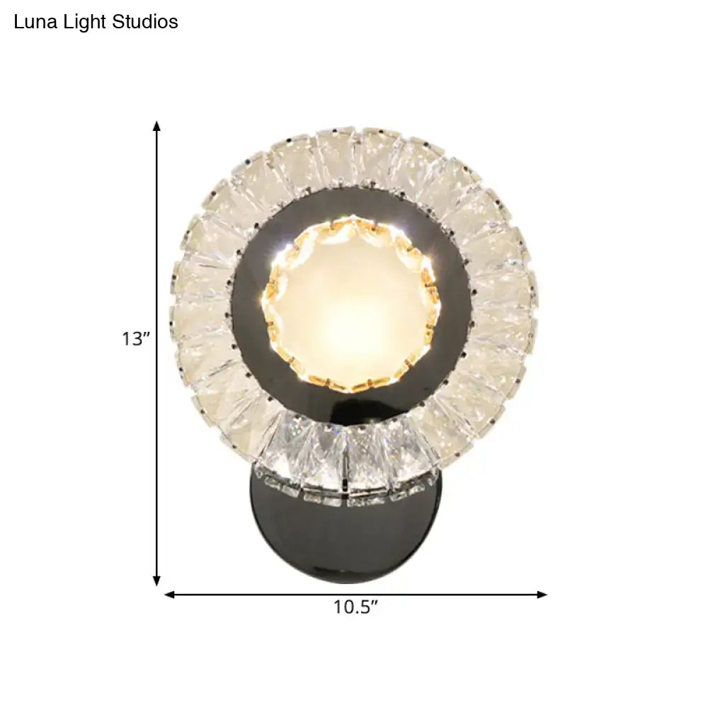 Crystal LED Wall Lamp by Decorbites with a faceted crystal ring and black mount on Tampa Home & Garden Store