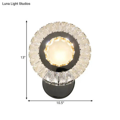 Crystal LED Wall Lamp by Decorbites with a faceted crystal ring and black mount on Tampa Home & Garden Store
