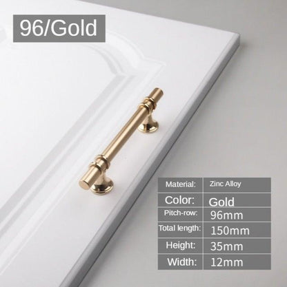 Stevvex cabinet pull 96mm gold zinc alloy on white cabinet door on Tampa Home & Garden Store
