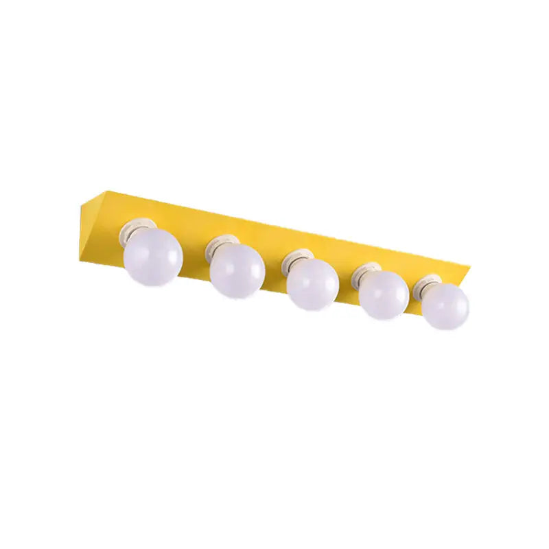 Decorbites vanity sconce with yellow backplate and five bare white bulbs on Tampa Home & Garden Store