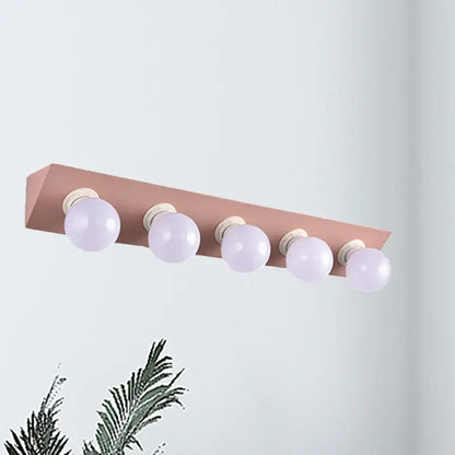 Pink Yellow Vanity Sconce Bare Bulb Design five-bulb bar with lavender bulbs Decorbites on Tampa Home & Garden Store