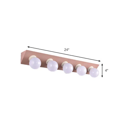 Pink yellow vanity sconce with five bare bulbs on copper-pink backplate Decorbites on Tampa Home & Garden Store