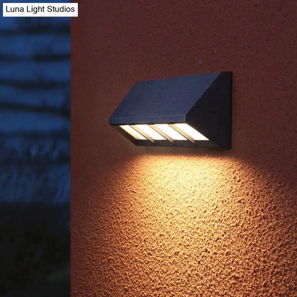 Modern matte black LED outdoor wall sconce with 3 light panels by Decorbites on Tampa Home & Garden Store