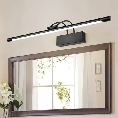 Modern matte black LED wall light vanity sconce by Decorbites above a bathroom mirror on Tampa Home & Garden Store