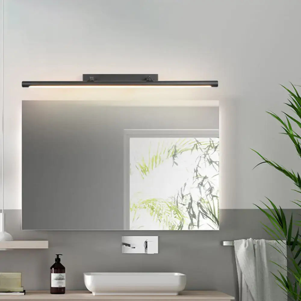 Black minimalist vanity light Decorbites metal bar above bathroom mirror with warm LED glow on Tampa Home & Garden Store