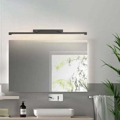 Black minimalist vanity light Decorbites metal bar above bathroom mirror with warm LED glow on Tampa Home & Garden Store