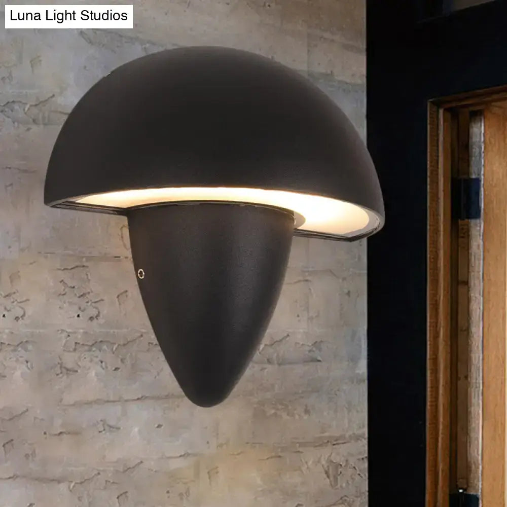 Black mushroom wall sconce matte black finish with warm inner glow Decorbites on Tampa Home & Garden Store