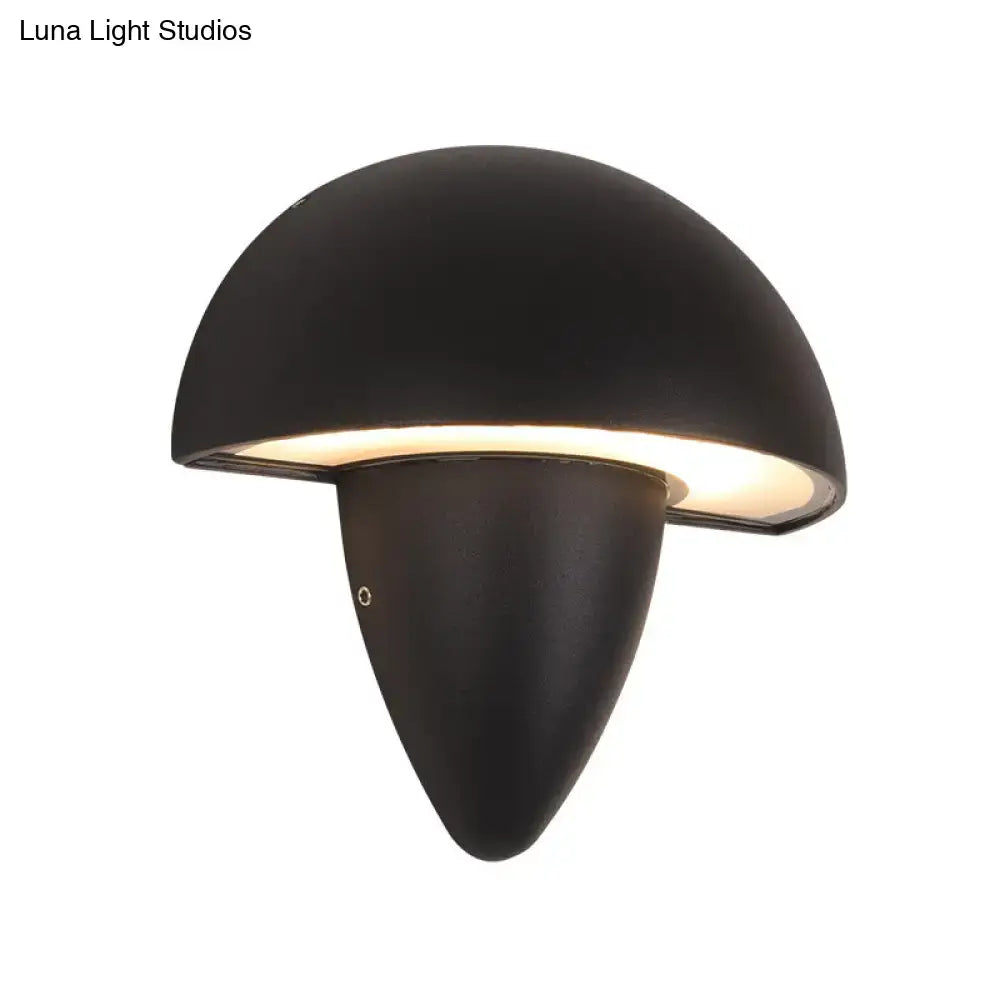 Black Mushroom Wall Sconce by Decorbites, black metal dome with warm light on Tampa Home & Garden Store