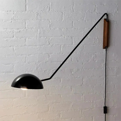 Decorbites swing-arm bedside wall lamp matte black with wood accent on Tampa Home & Garden Store