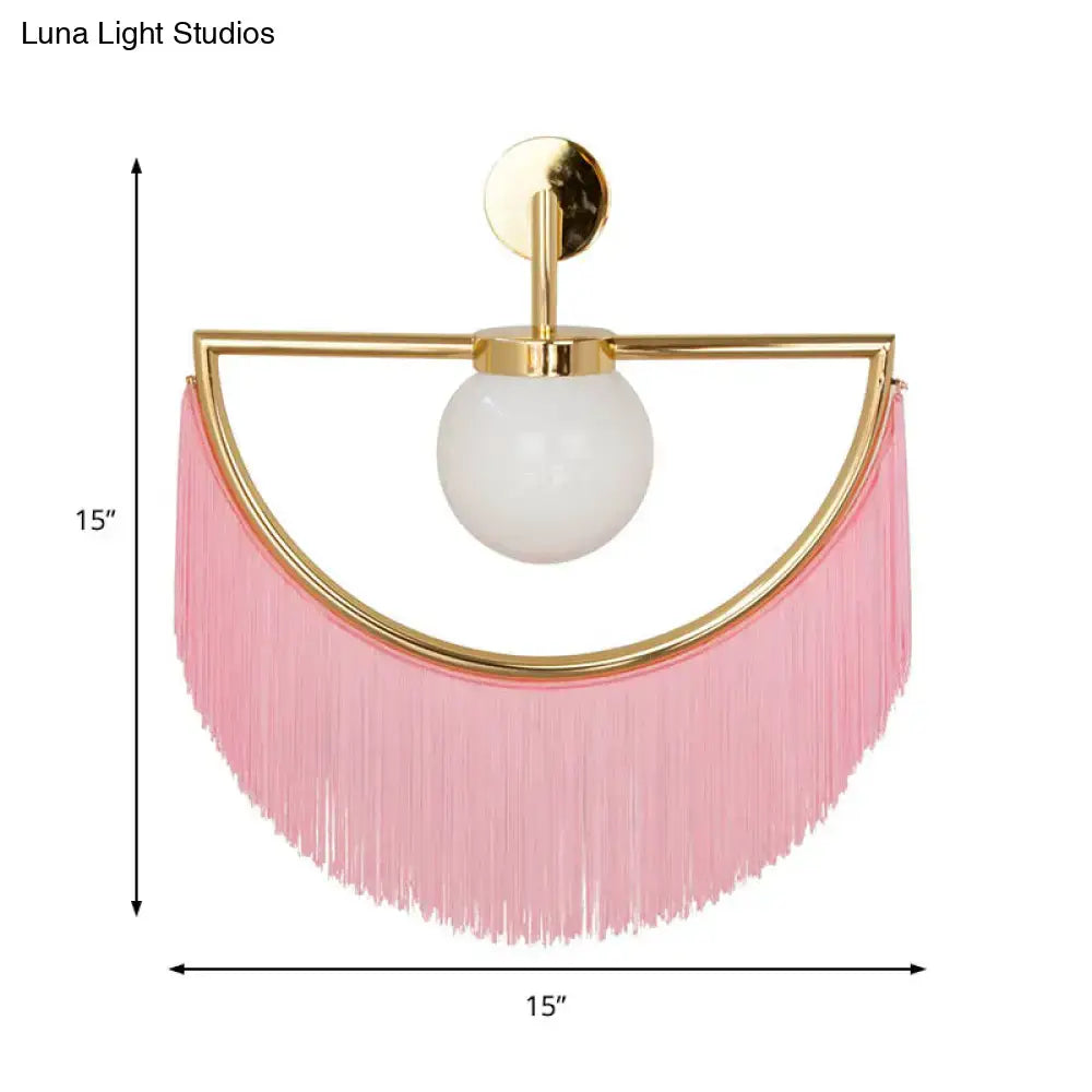 White Glass Wall Sconce by Decorbites with gold arc and pink fringe tassels, 15in wide on Tampa Home & Garden Store