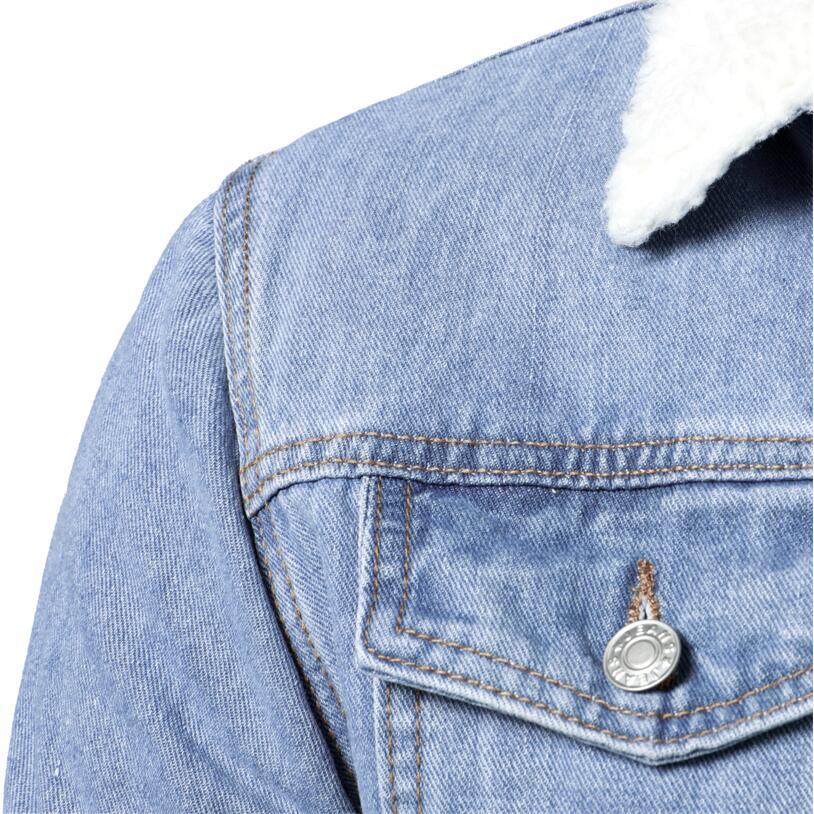 Light blue denim trucker jacket close-up with shearling collar and metal button on Tampa Home & Garden Store