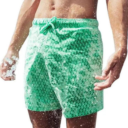 Stevvex men's green quick-dry boardshorts with white geometric triangle pattern on Tampa Home & Garden Store