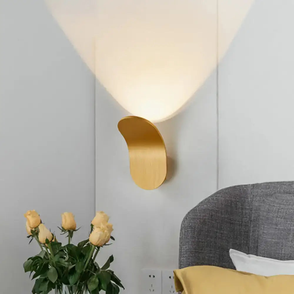 Decorbites Black Gold Wall Sconce industrial bracket curved brass finish on gray wall on Tampa Home & Garden Store