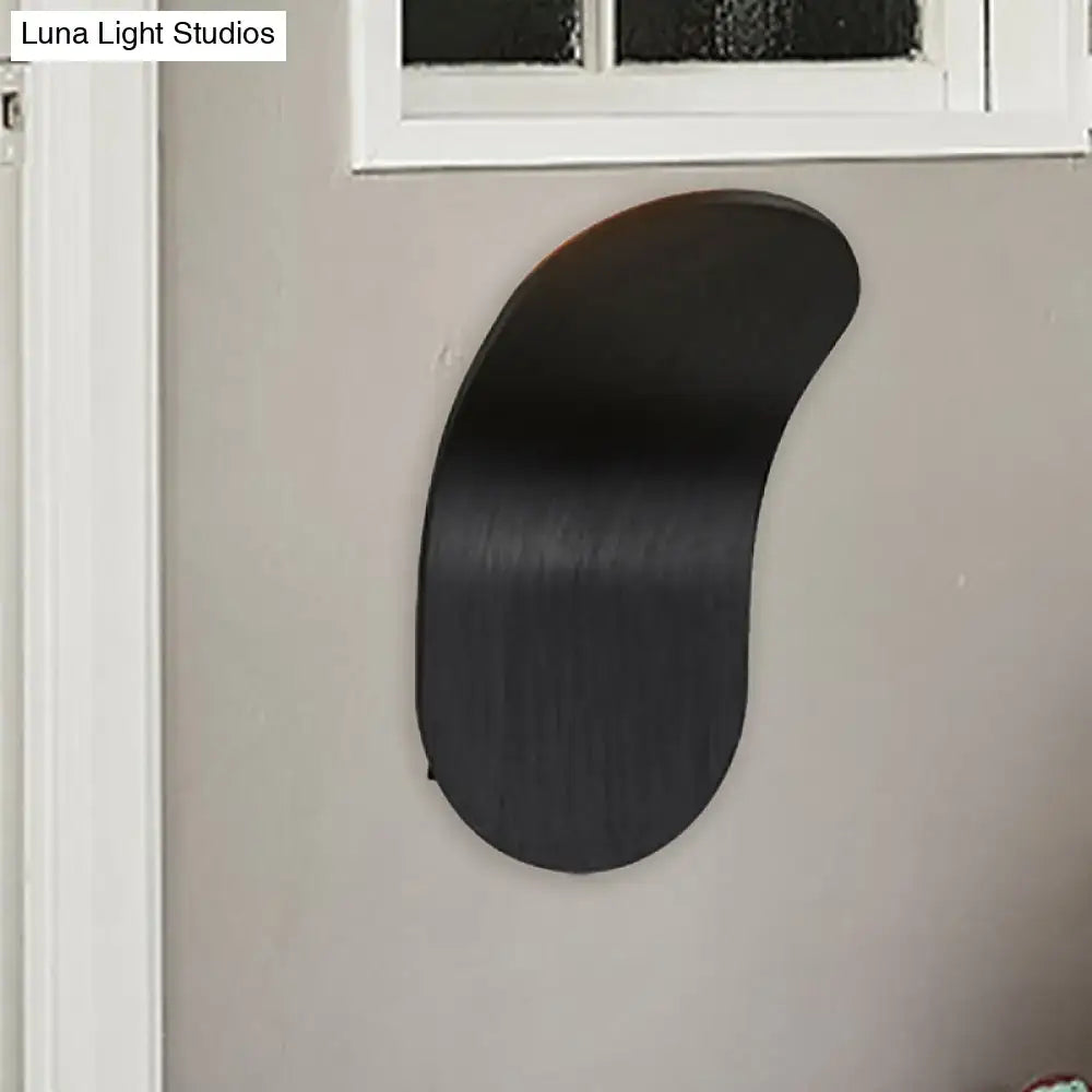 Black industrial wall sconce bracket by Decorbites, curved flat metal design on Tampa Home & Garden Store