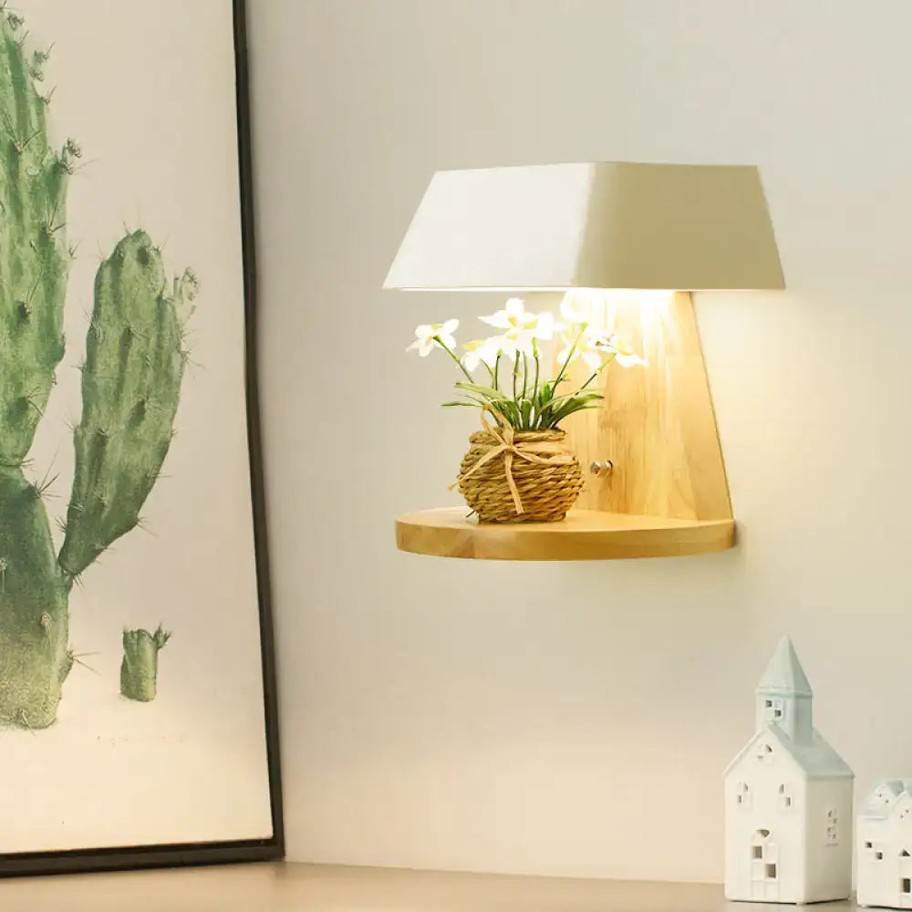 Decorbites white metal backplate sconce with wood shelf and white lampshade wicker plant basket on Tampa Home & Garden Store