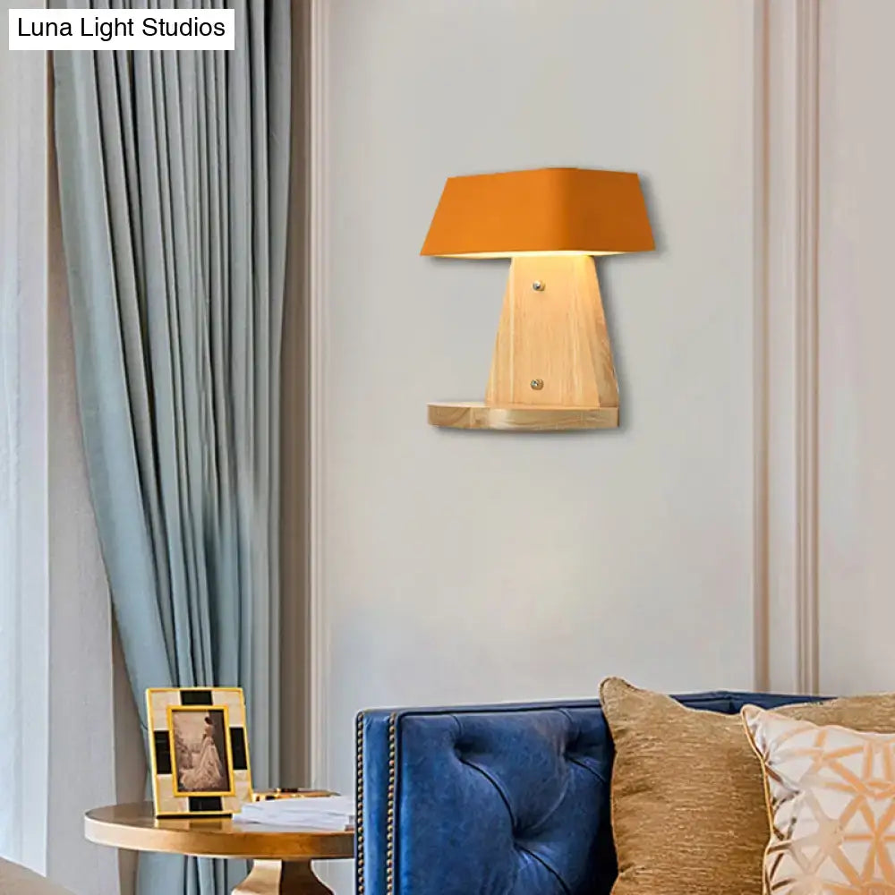 White Metal Wood Backplate Sconce with warm orange lampshade on Tampa Home & Garden Store