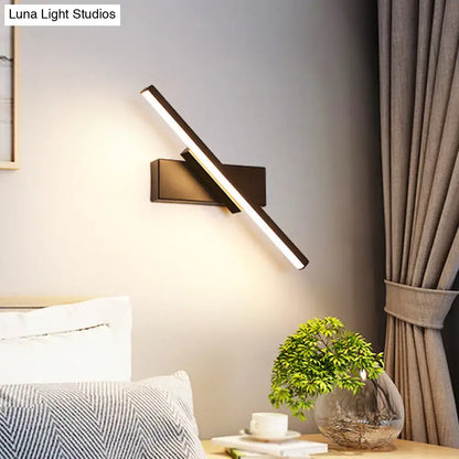 Vanity sconce with black matte frame and diagonal white LED bar by Decorbites on Tampa Home & Garden Store