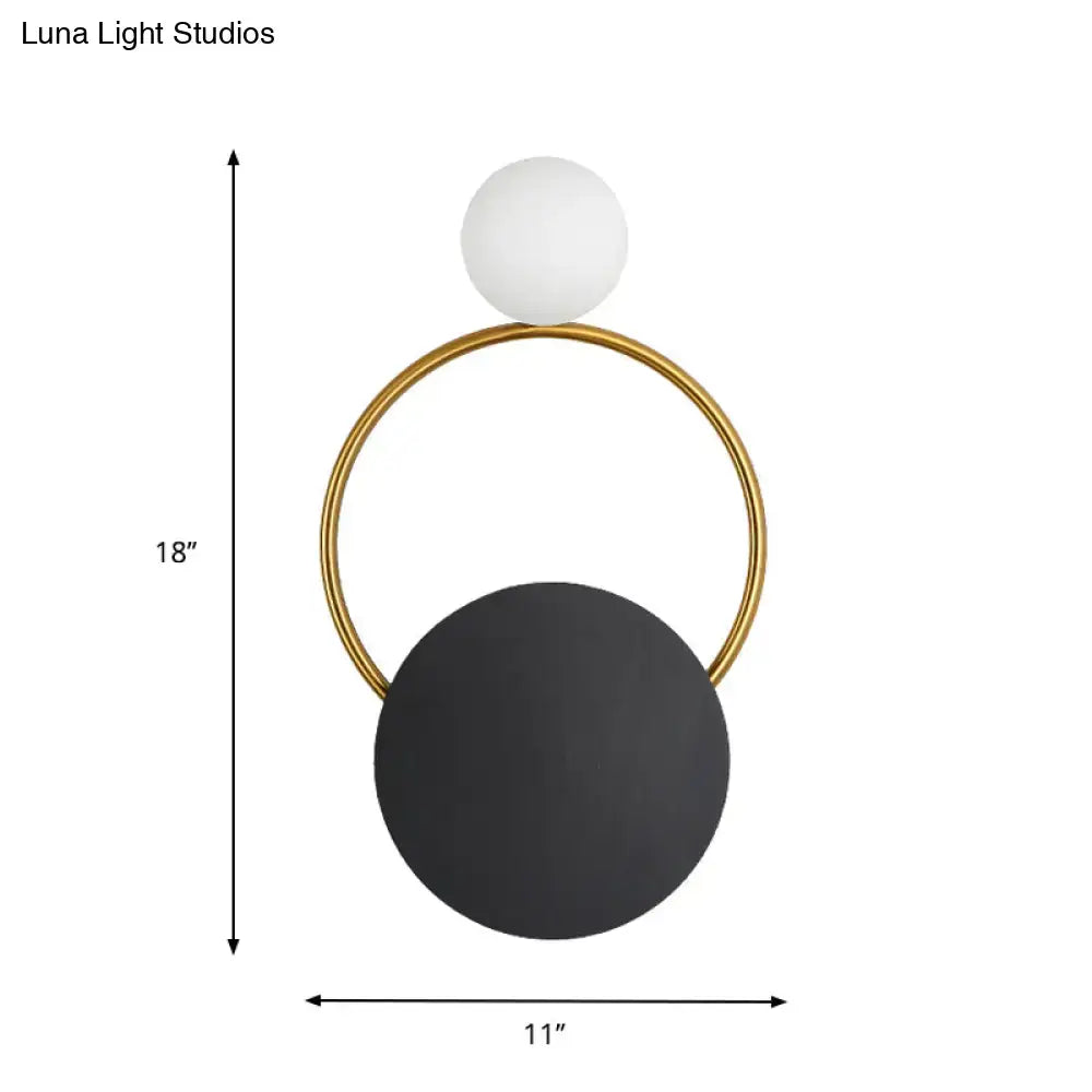 Black Gold Wall Light Sconce with gold ring and black disc and white globe by Decorbites on Tampa Home & Garden Store