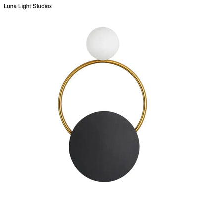 Black Gold Wall Light Sconce with a gold ring frame, white glass globe, and black disk shade on Tampa Home & Garden Store