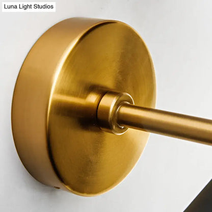 Black Gold Cast Iron Dual-Bulb Sconce by Decorbites with round backplate and gold arm on Tampa Home & Garden Store