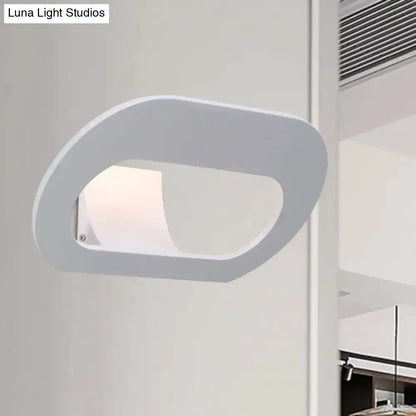 Wall lamp with a black and grey oval shade, modern minimalist Decorbites bedroom lighting on Tampa Home & Garden Store