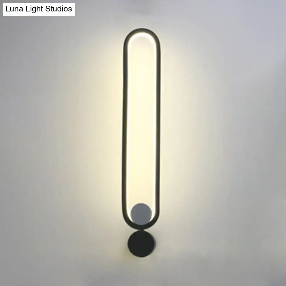 Black Adjustable LED Sconce by Decorbites, slim vertical light bar, wall-mounted on Tampa Home & Garden Store