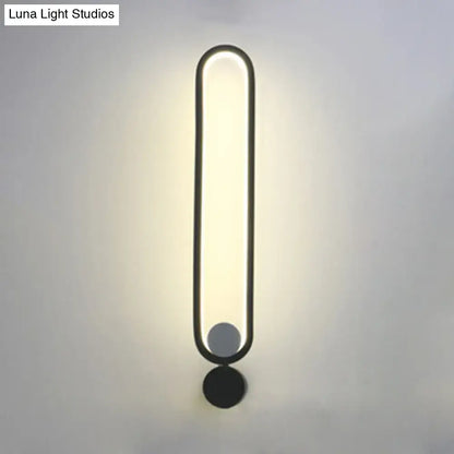 Black Adjustable LED Sconce by Decorbites, slim vertical light bar, wall-mounted on Tampa Home & Garden Store