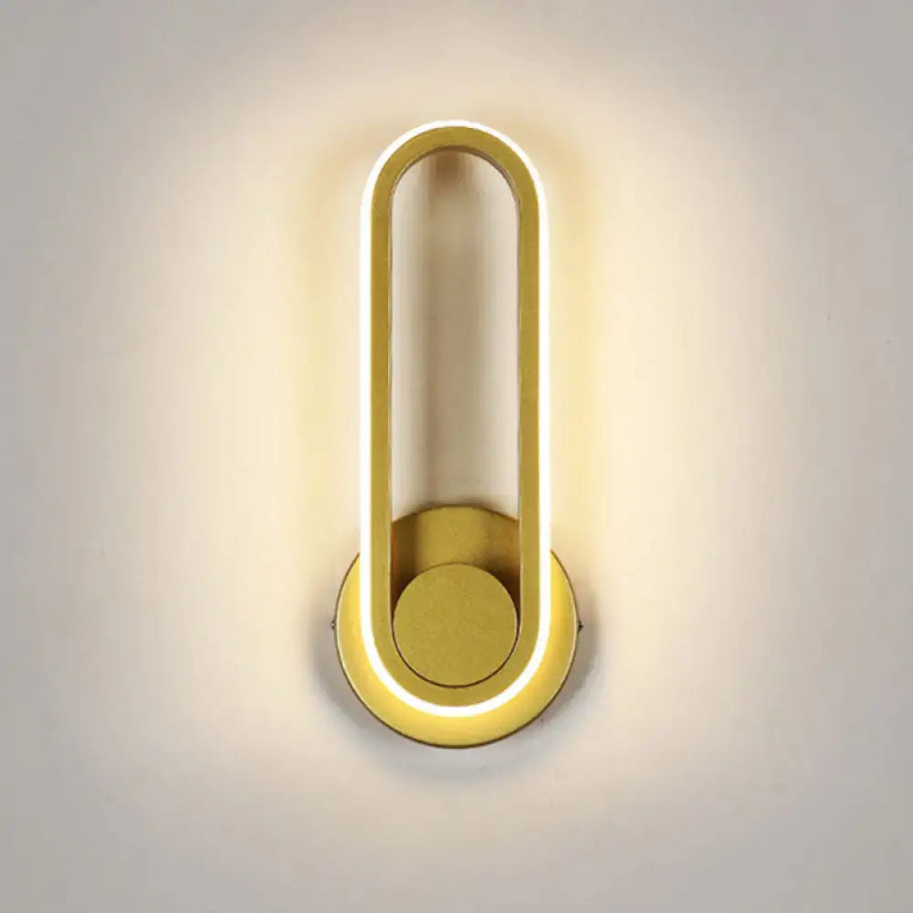 Matte gold oval wall sconce by Decorbites with LED halo on Tampa Home & Garden Store