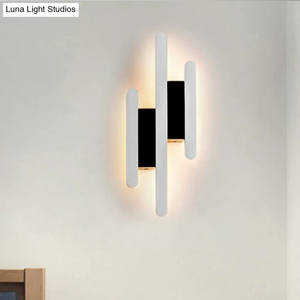 White Acrylic Wall Sconce with three multi-height vertical bars in white/black by Decorbites on Tampa Home & Garden Store