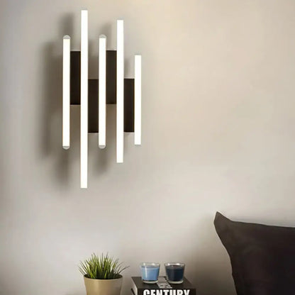 White acrylic wall sconce with multi-height vertical bars, modern lighting fixture on wall on Tampa Home & Garden Store