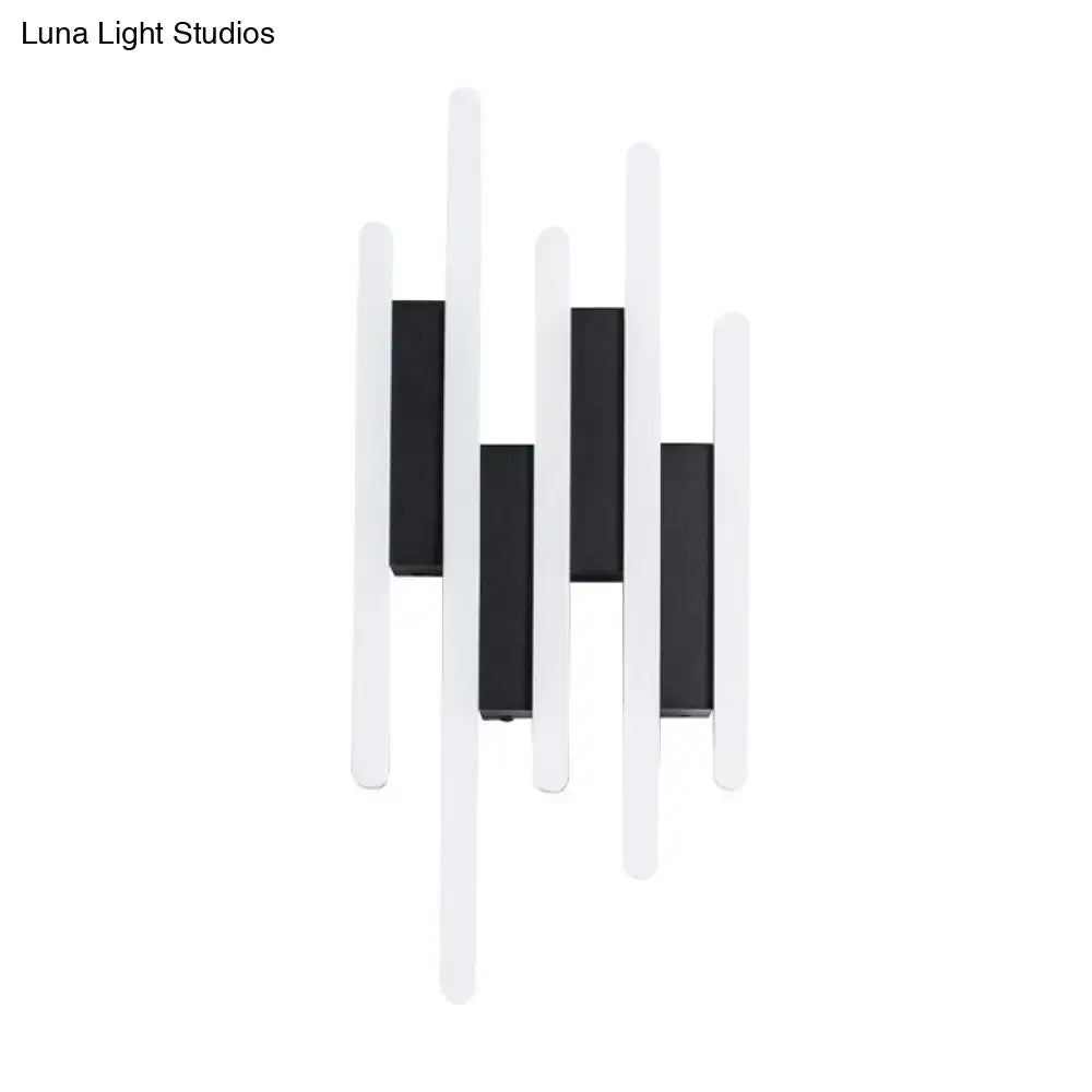 White acrylic wall sconce with multi-height bars and black backplates by Decorbites on Tampa Home & Garden Store