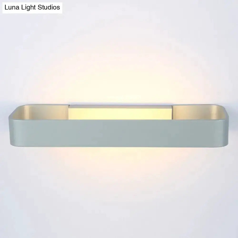 Modern minimalist black & white rectangular wall lamp by Decorbites with warm ambient glow on Tampa Home & Garden Store