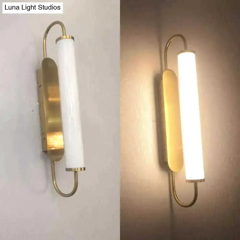 Decorbites gold LED cylindrical wall lamp with brass frame and frosted diffuser on Tampa Home & Garden Store