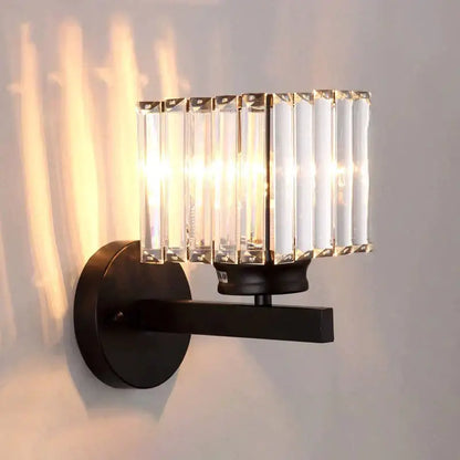 Gold Crystal Wall Lamp wall light with black metal base and crystal block shade, warm glow on Tampa Home & Garden Store