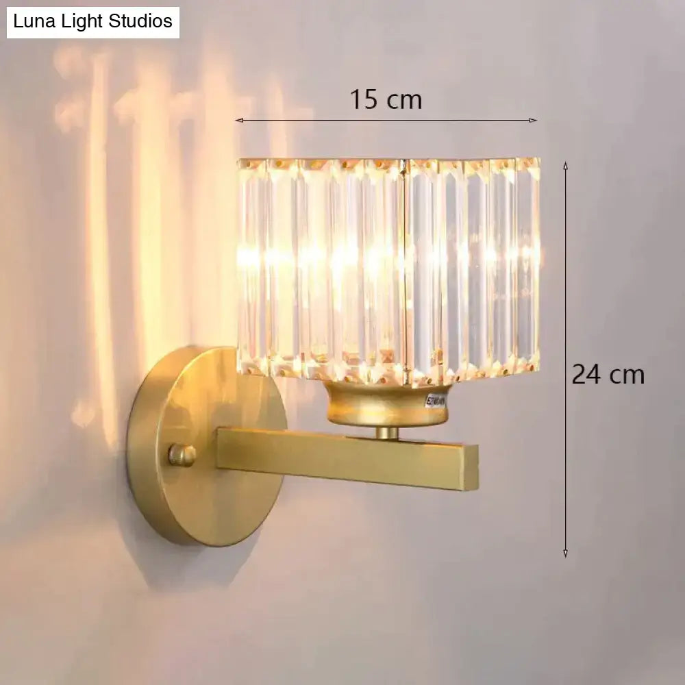 Gold crystal wall lamp Decorbites wall light with gold finish and crystal prisms 24 cm high on Tampa Home & Garden Store