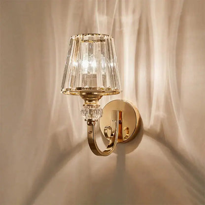Gold crystal wall lamp with curved brass sconce and faceted glass shade Decorbites on Tampa Home & Garden Store