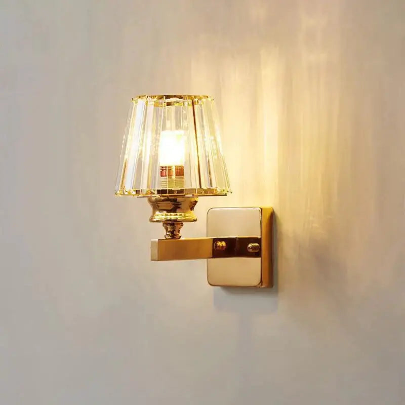 Gold crystal wall lamp by Decorbites with clear crystal shade on Tampa Home & Garden Store