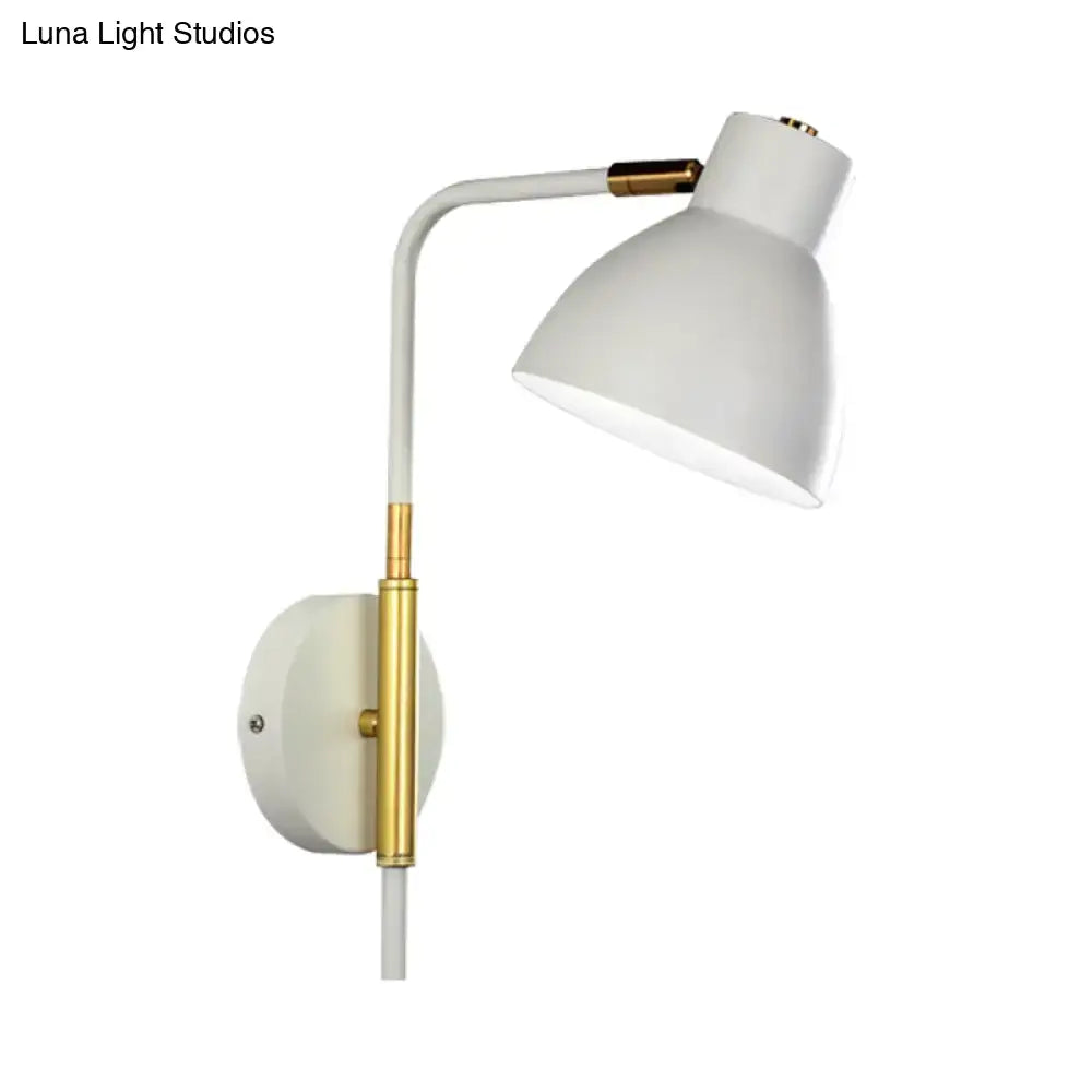 Gold rod wall sconce with white shade and curved arm, brass accents on Tampa Home & Garden Store