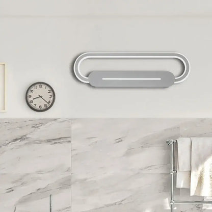 Gray oval LED wall sconce by Decorbites, modern minimalist bedroom light on Tampa Home & Garden Store