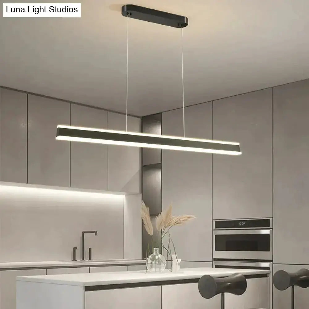 Decorbites modern black LED pendant light, minimalist linear bar over kitchen island on Tampa Home & Garden Store
