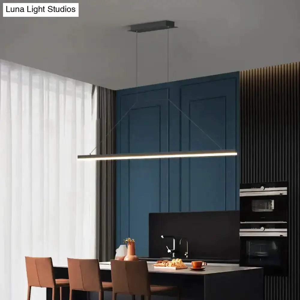 Pendant light modern minimalist LED black by Decorbites over dining table on Tampa Home & Garden Store