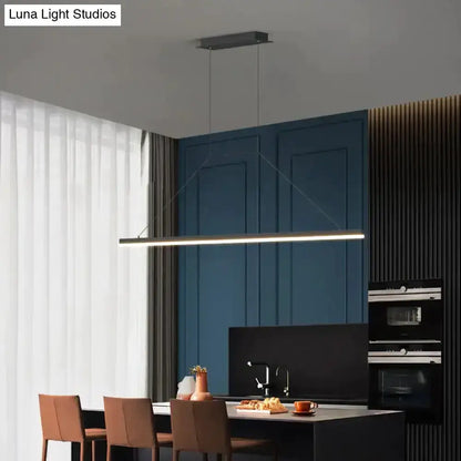 Pendant light modern minimalist LED black by Decorbites over dining table on Tampa Home & Garden Store