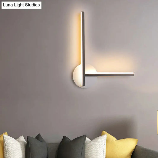 Black linear wall light with vertical and horizontal bars, acrylic diffuser, dual-temp LED, round backplate on Tampa Home & Garden Store
