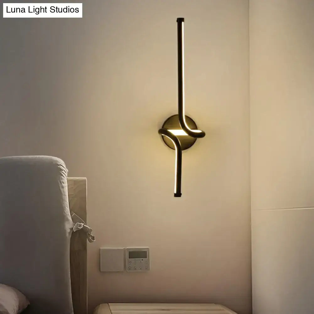Modern metallic LED wall sconce with brass finish Decorbites bedroom lighting on Tampa Home & Garden Store