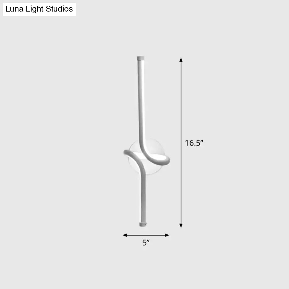 Modern minimalist metallic LED wall sconce by Decorbites with curved arm and backing on Tampa Home & Garden Store
