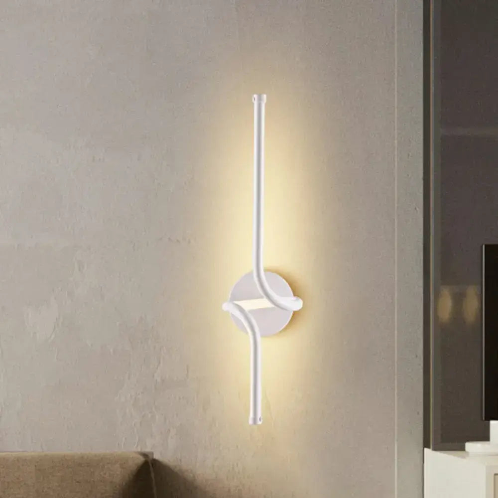 Modern minimalist white metal LED wall sconce with vertical tubes and circular mount for bedroom on Tampa Home & Garden Store