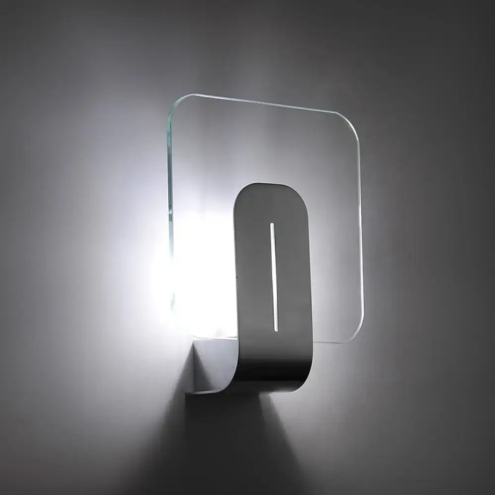 Decorbites Nickel Glass Wall Sconce with clear rounded glass panel and nickel finish wall mount on Tampa Home & Garden Store